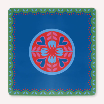 Mockup of a luxury Hearts & Flowers mahjong mat featuring vivid azure and red tones with soft gray green details and subtle pink accents, designed in a bright floral and holiday-inspired style.