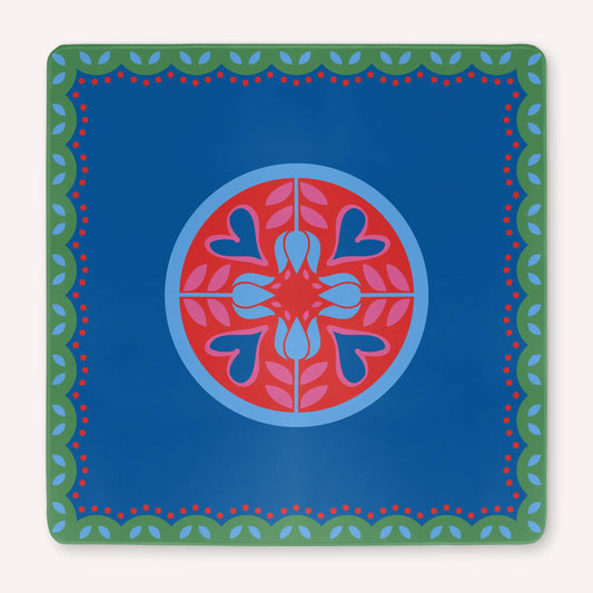 Mockup of a luxury Hearts & Flowers mahjong mat featuring vivid azure and red tones with soft gray green details and subtle pink accents, designed in a bright floral and holiday-inspired style.