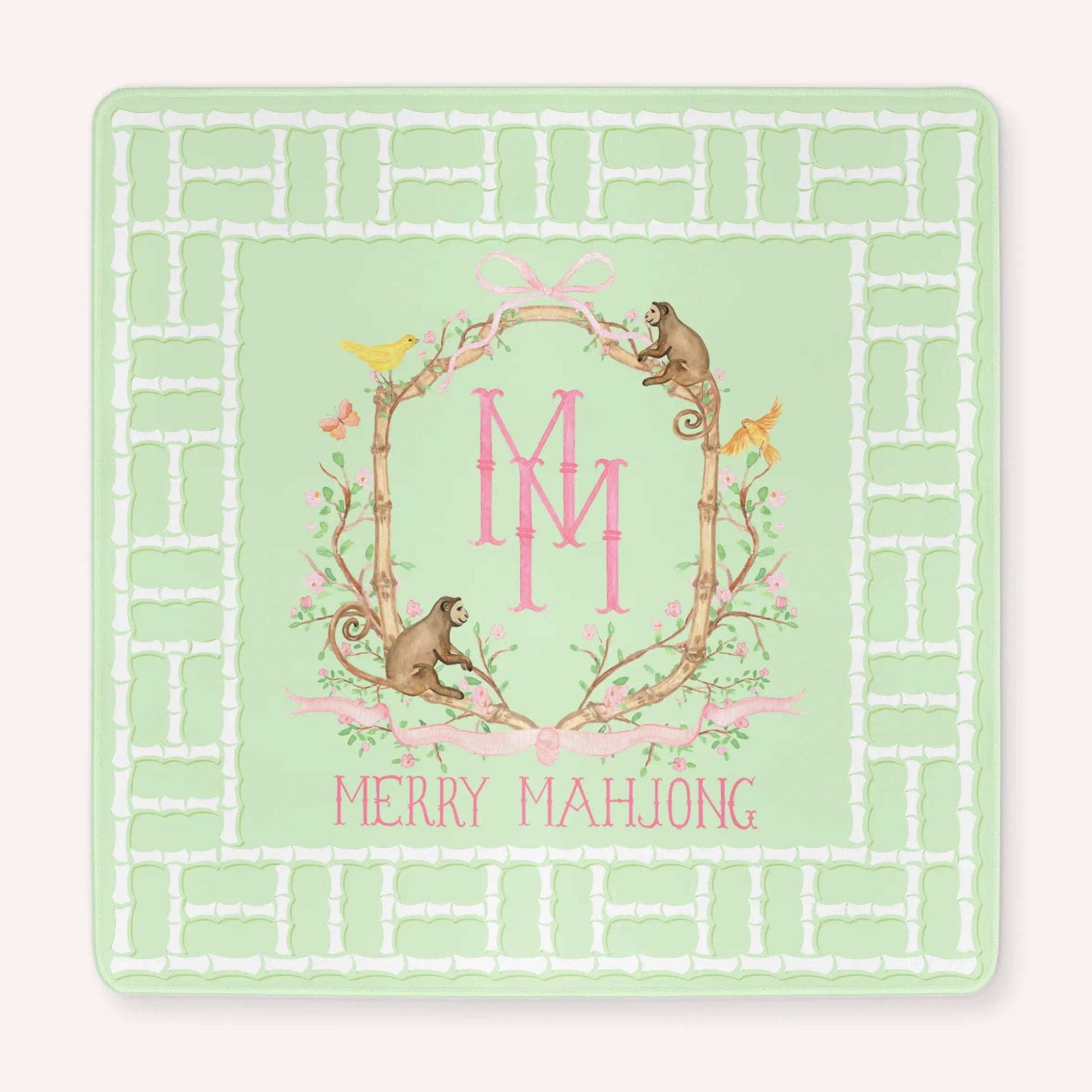 Light Green Mahjong Mat with a lattice bamboo border and the TheMerryMahjongCo Logo featuring floral elements alongside monkeys, birds and butterflies.