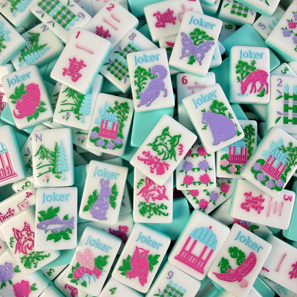 The Southern Springs Tile Collection, piled together, showing all the tile types with the backs of some tiles showing.