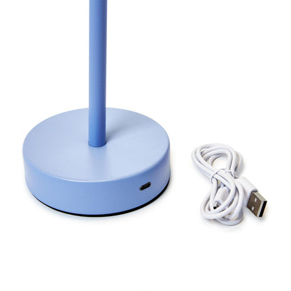 Close-up of charging port on blue cordless LED table lamp