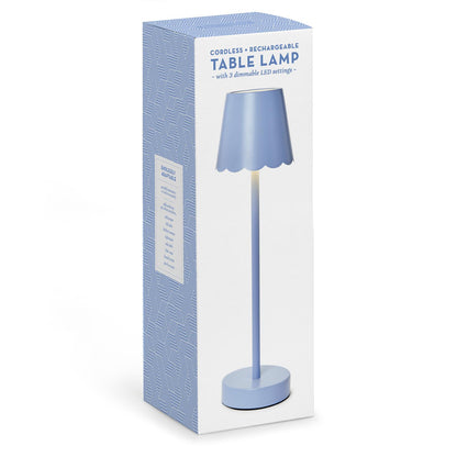 Blue cordless LED table lamp in retail packaging box