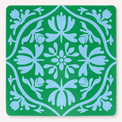 Tulip Terrace Emerald Mist Mahjong mat mockup featuring powder blue tulips on a vivid green background.