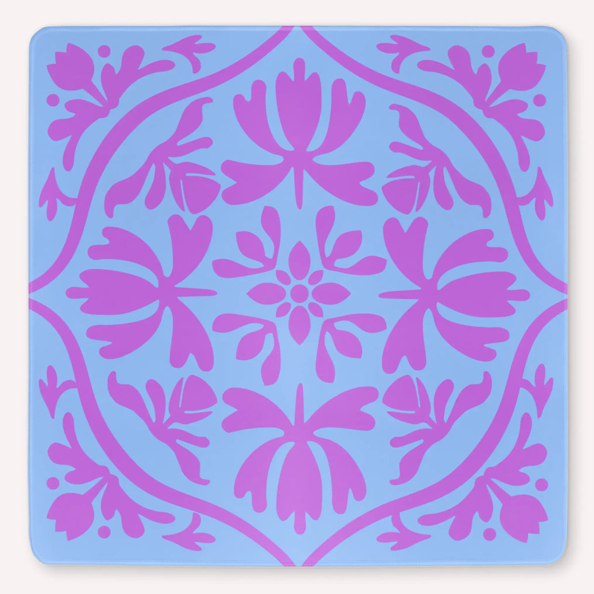 Tulip Terrace Lavender Ice Mahjong mat mockup featuring pastel lavender tulips on an ice blue background.