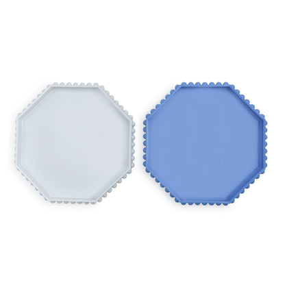 Octagonal lacquered trays with hobnail edge in blue and white side by side