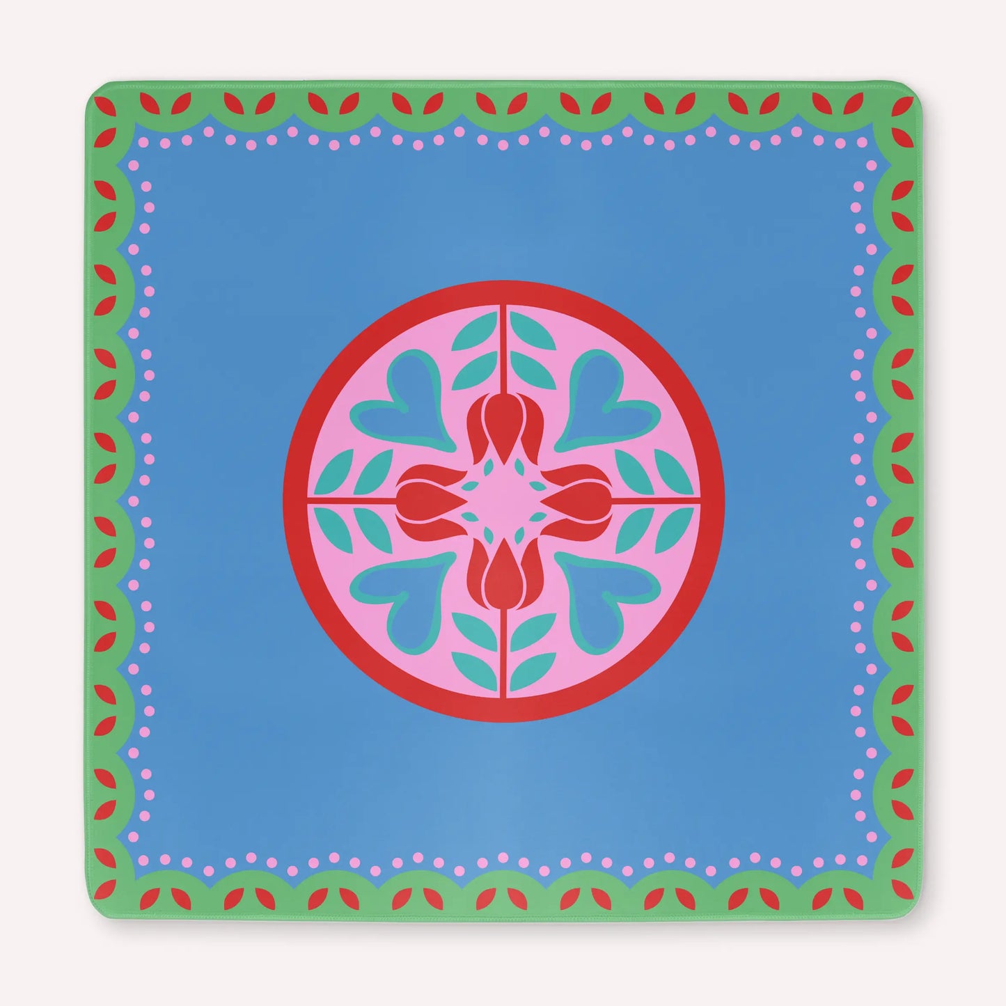 Mockup of a luxury Hearts & Flowers mahjong mat featuring a festive palette of vivid azure, gray green, red, and pink tones with a bright, cheerful floral and holiday-inspired design.