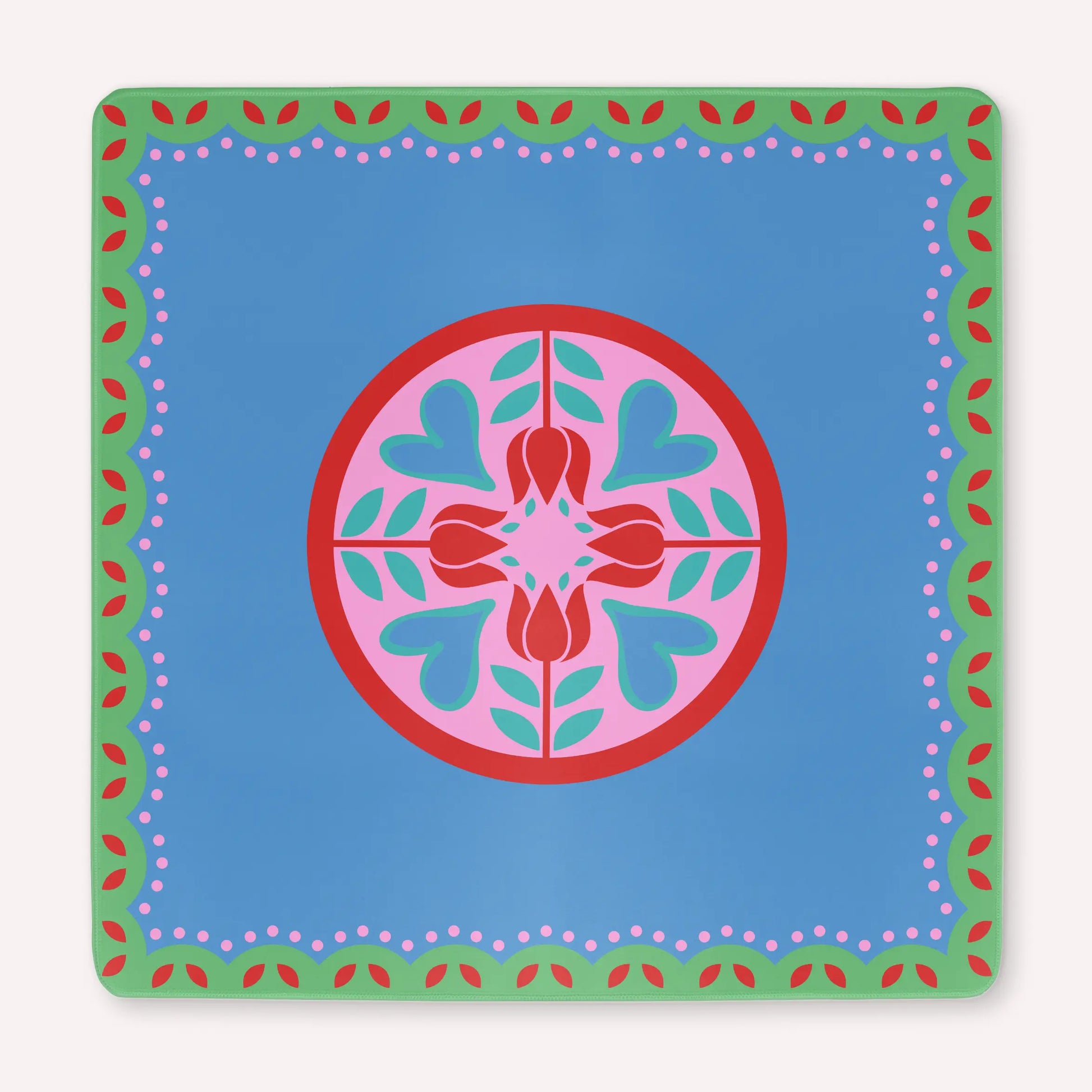Mockup of a luxury Hearts & Flowers mahjong mat featuring a festive palette of vivid azure, gray green, red, and pink tones with a bright, cheerful floral and holiday-inspired design.
