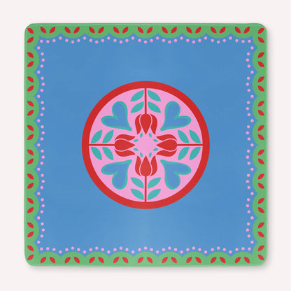 Mockup of a luxury Hearts & Flowers mahjong mat featuring a festive palette of vivid azure, gray green, red, and pink tones with a bright, cheerful floral and holiday-inspired design.