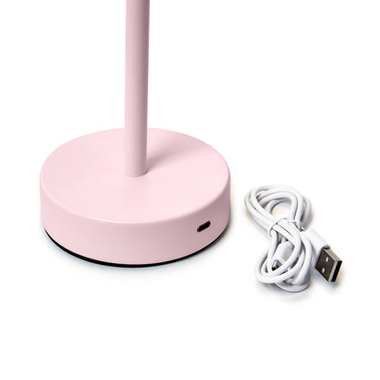 Close-up of charging port on pink cordless LED table lamp
