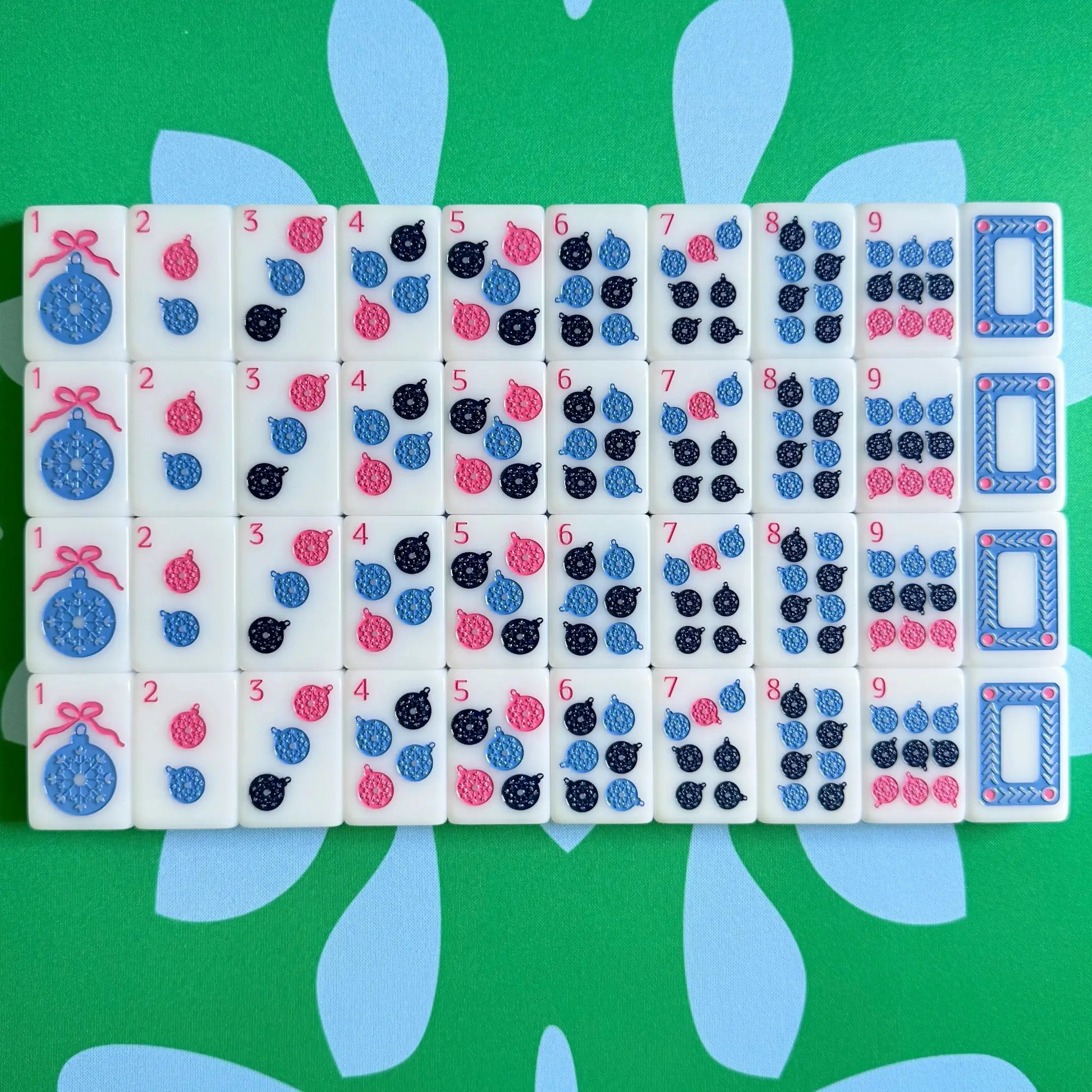 The Scandinavian Christmas Mahjong Collection's dots and white dragons displayed as they come packaged.
