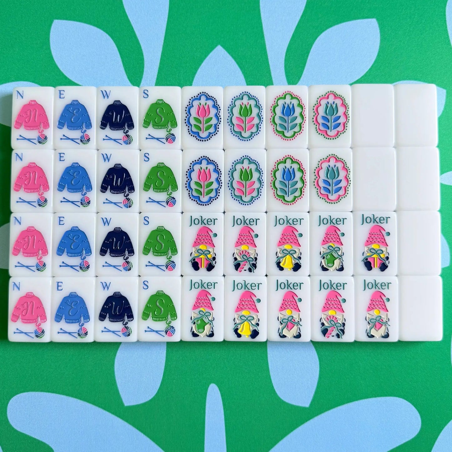 The Scandinavian Christmas Mahjong Collection's winds, jokers, flowers and blanks displayed as they come packaged.