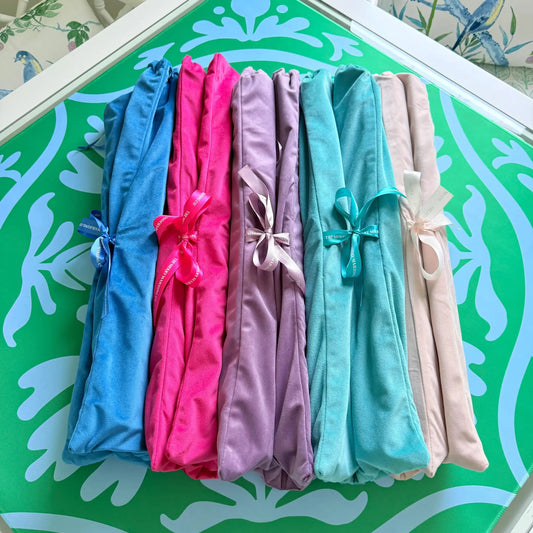 All of the velvet mahjong rack bag color options displayed together, including: blue, purple, hot pink, green and dusty light pink.