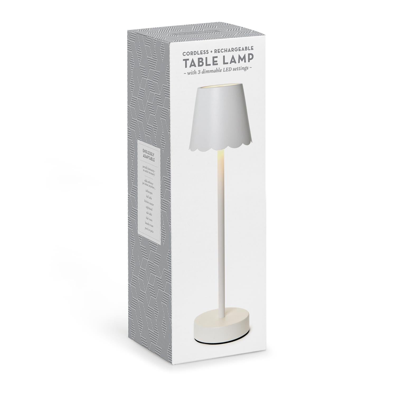 White cordless LED table lamp in retail packaging box