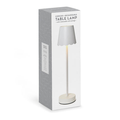 White cordless LED table lamp in retail packaging box